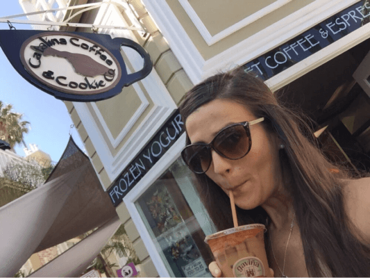 Enjoying a cold iced coffee from Catalina Coffee and Cookie Co!