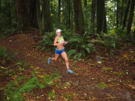 Renee Metivier leads the race at mile 9.